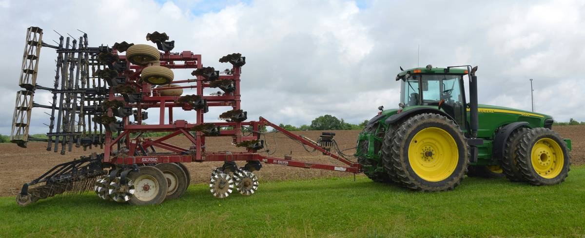 Hand cultivator in use showing what is the meaning of cultivator through soil aeration