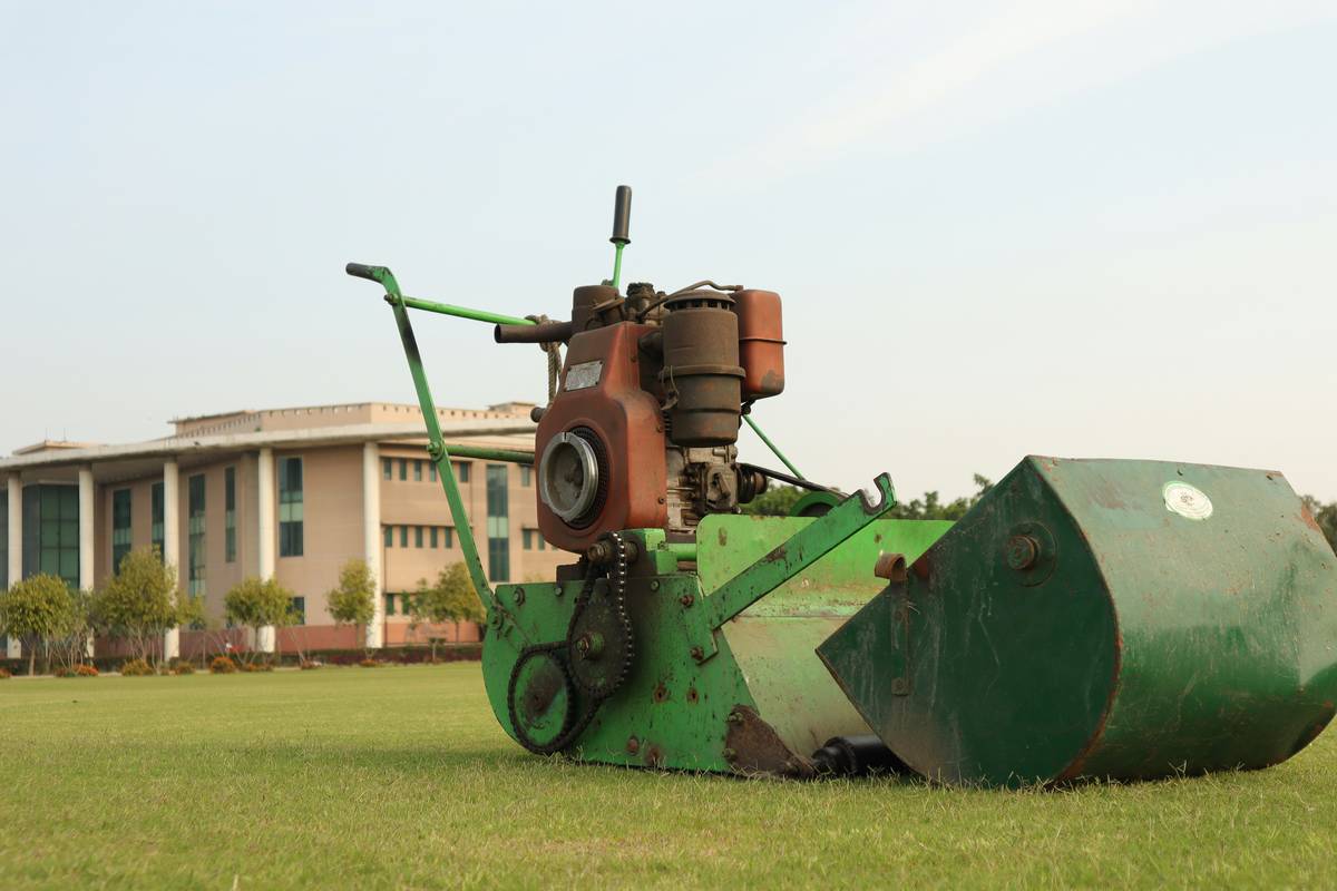 Walk-behind cultivator for planting grass seed preparing a large lawn area